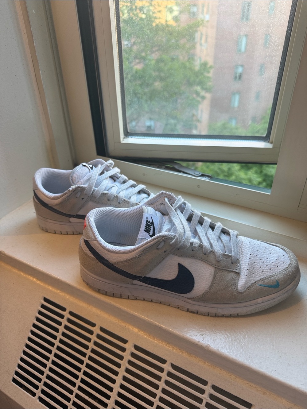 Nike Men’s Dunk Low-Top Sneakers in White and Navy